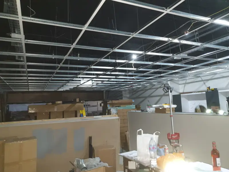 New suspended ceilings in the expansion of Birkenhead Specsavers.: Swipe To View More Images
